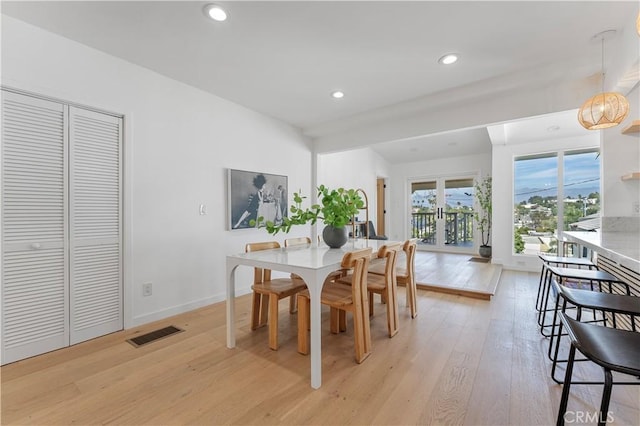 dining room featuring light hardwood / wood-style flooring