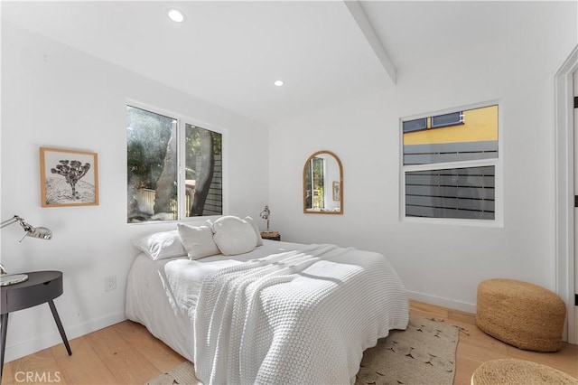 bedroom with light hardwood / wood-style flooring