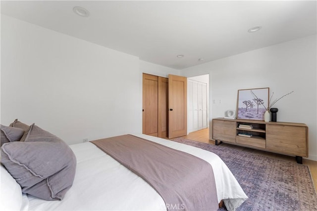 bedroom featuring light wood-type flooring