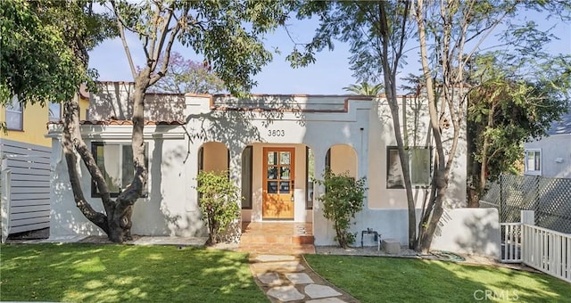 view of front of house with a front lawn