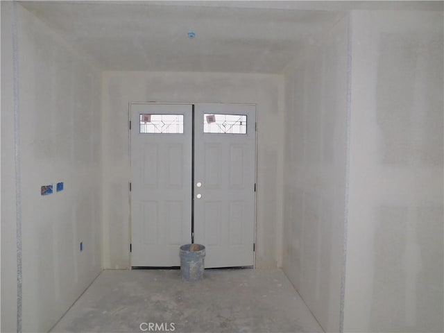 entrance foyer with concrete floors