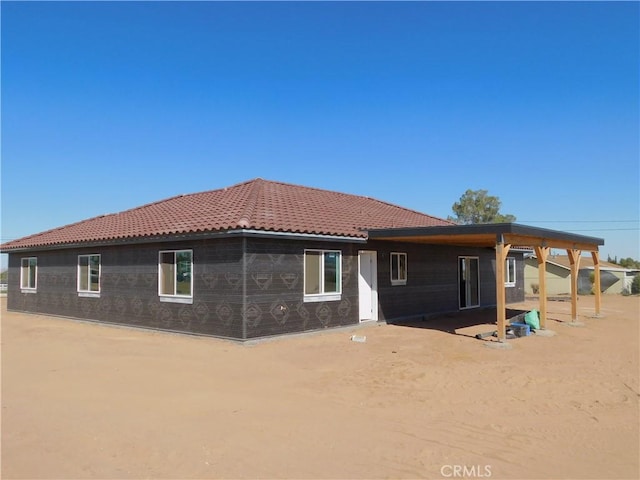 back of house featuring a patio