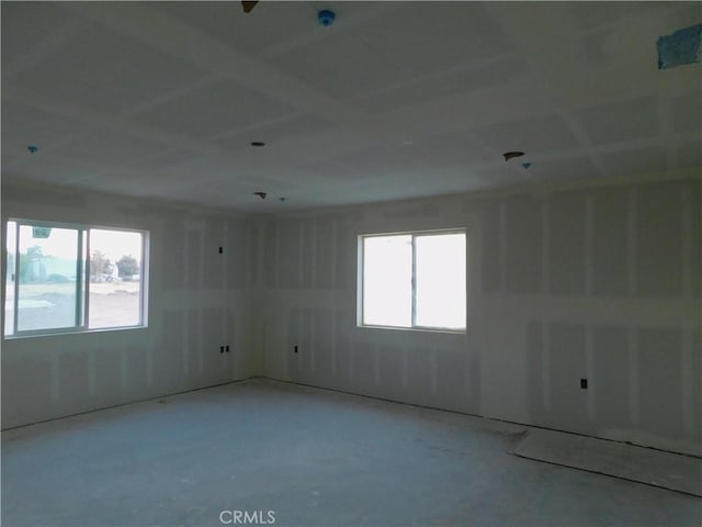 spare room with concrete flooring