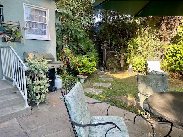 view of patio with a grill