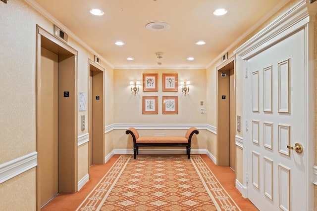 corridor with baseboards, elevator, ornamental molding, and recessed lighting