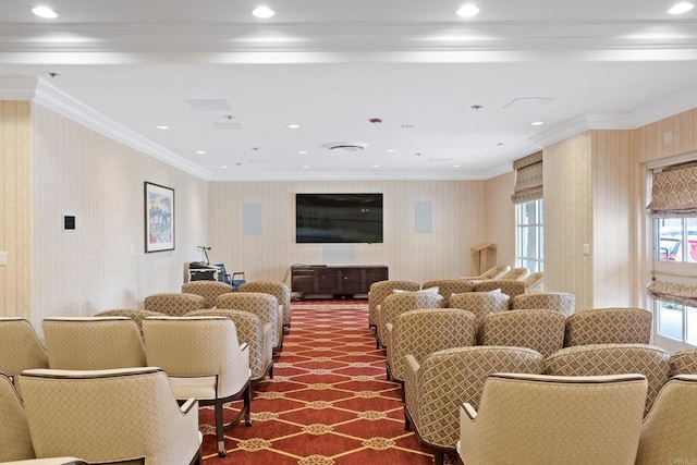 living area featuring dark carpet, recessed lighting, and ornamental molding