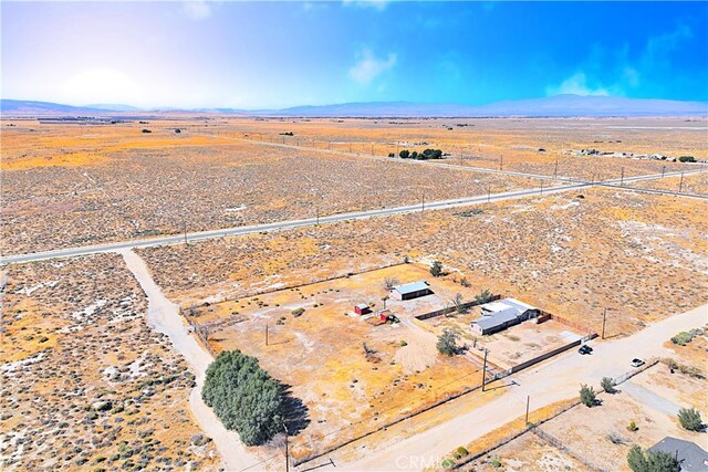 birds eye view of property featuring a rural view