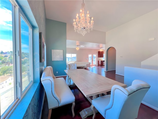 dining room featuring a notable chandelier and dark hardwood / wood-style floors