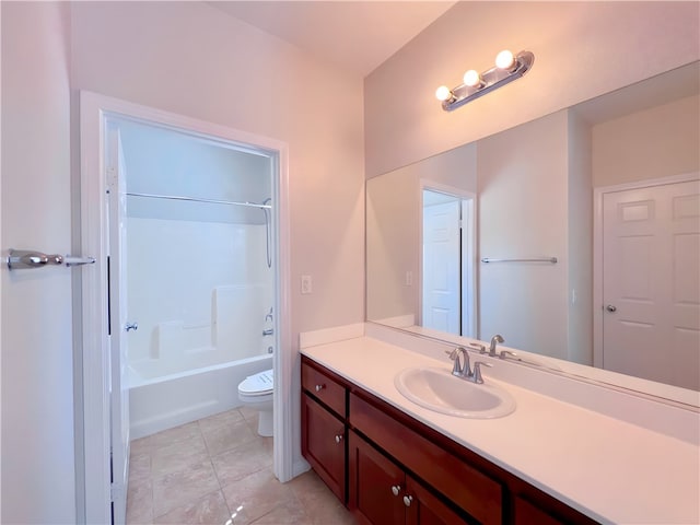 full bathroom featuring tile patterned floors, vanity, toilet, and bathtub / shower combination