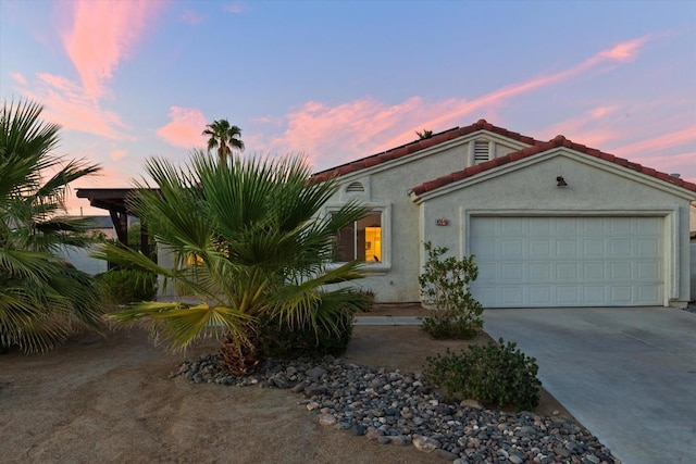 view of front of property featuring a garage