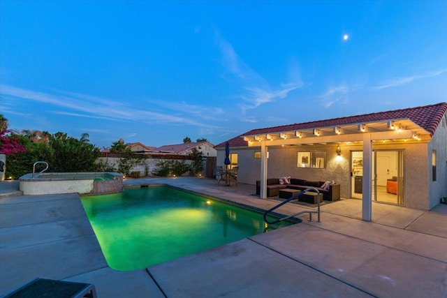 pool at dusk featuring an outdoor living space, a patio area, a pergola, and an in ground hot tub