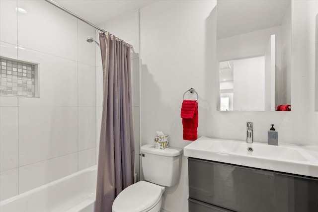 full bathroom featuring vanity, toilet, and shower / bathtub combination with curtain