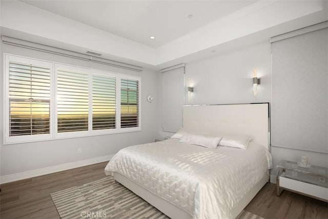 bedroom featuring hardwood / wood-style floors