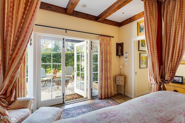 tiled bedroom with beam ceiling, access to outside, and multiple windows