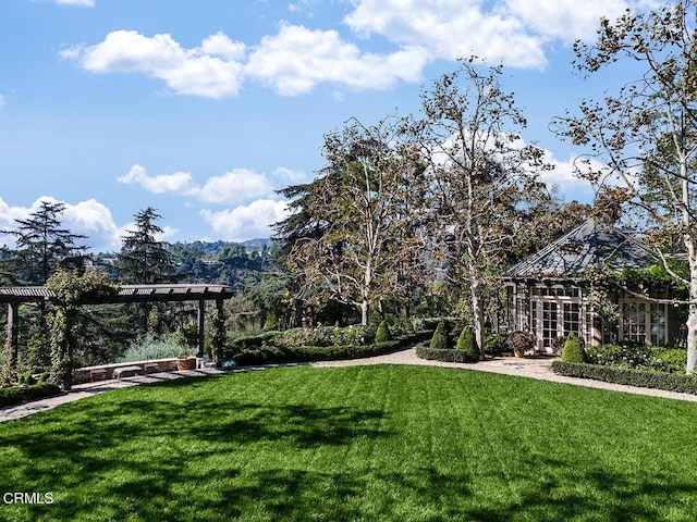 view of yard with a pergola