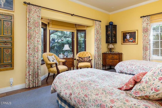 bedroom featuring ornamental molding and dark wood-type flooring