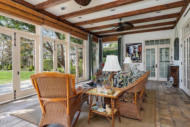 sunroom with ceiling fan, french doors, and beamed ceiling