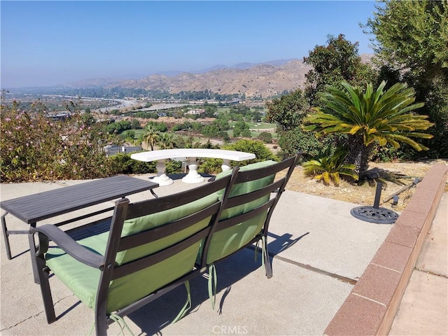 view of patio featuring a mountain view