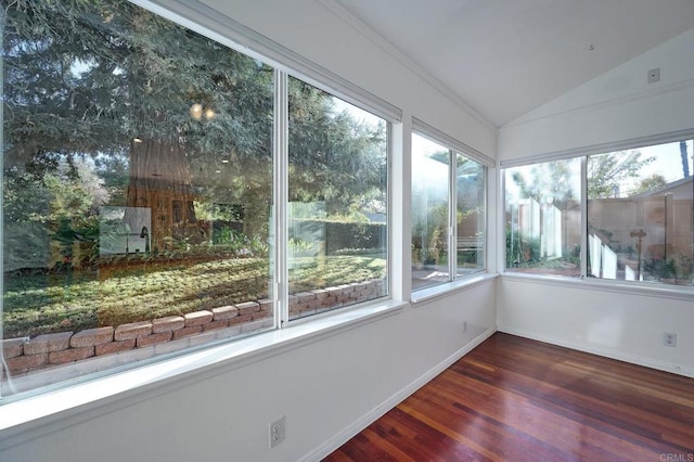 unfurnished sunroom with vaulted ceiling