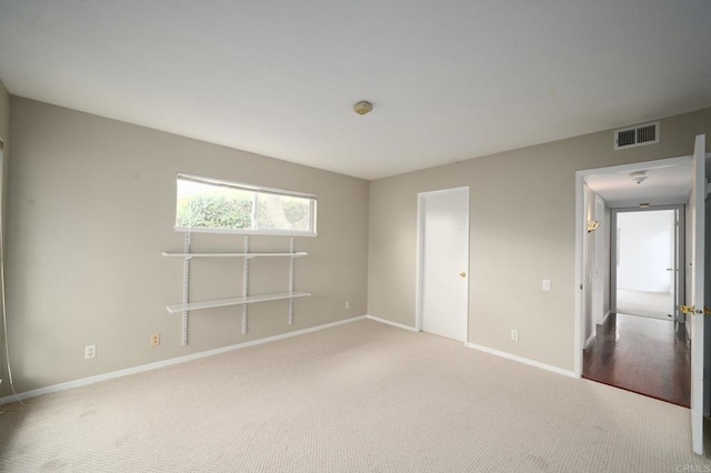 unfurnished bedroom with carpet