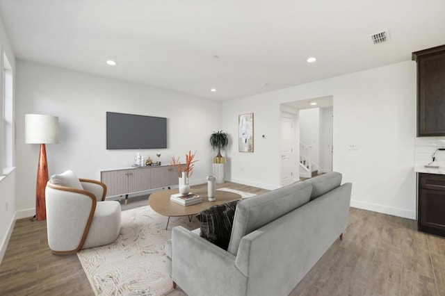 living room featuring light wood-type flooring