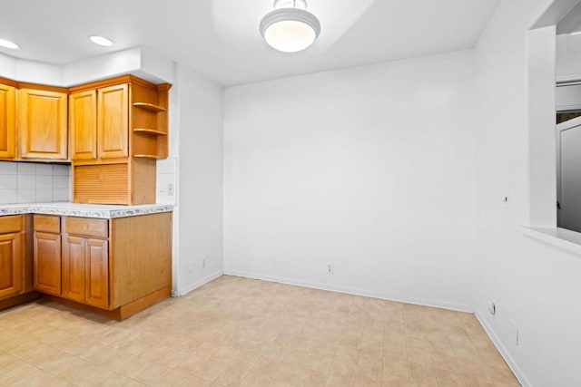 kitchen featuring tasteful backsplash