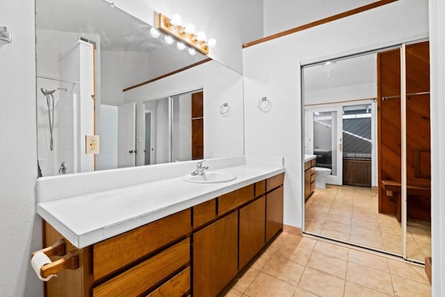 bathroom featuring vanity and tile patterned floors