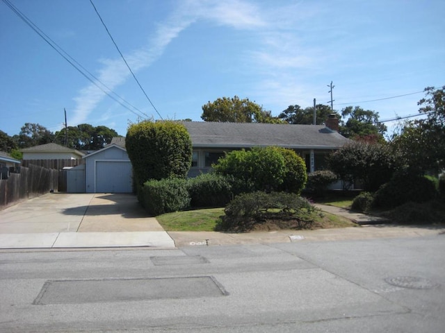 single story home featuring a garage