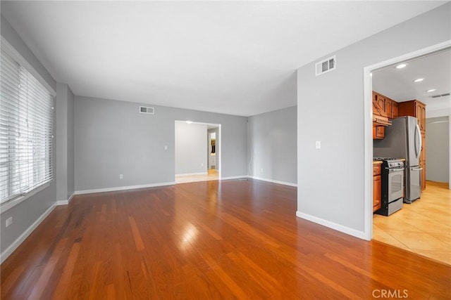 empty room featuring light hardwood / wood-style floors