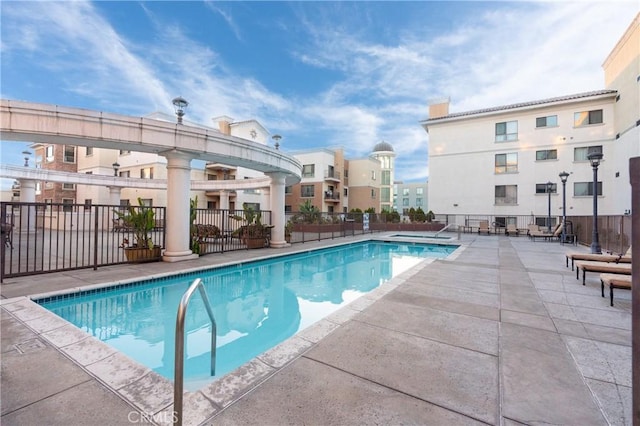 view of swimming pool featuring a patio