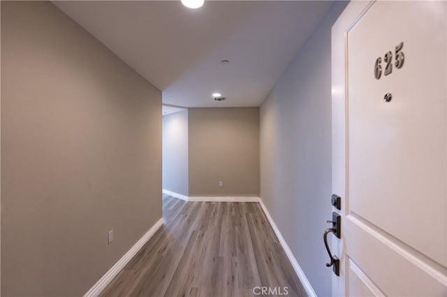 hall featuring hardwood / wood-style flooring