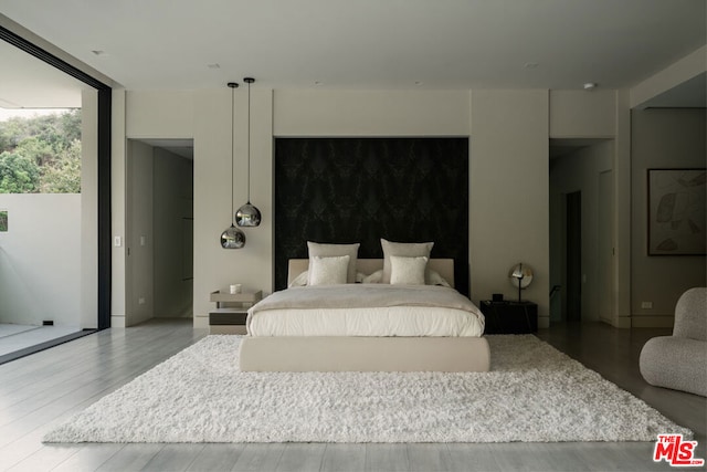 bedroom featuring light hardwood / wood-style flooring