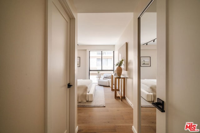 hallway featuring light hardwood / wood-style floors