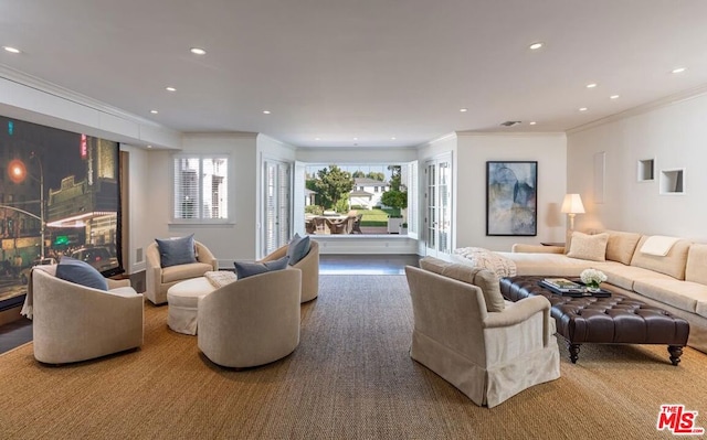 living room featuring crown molding