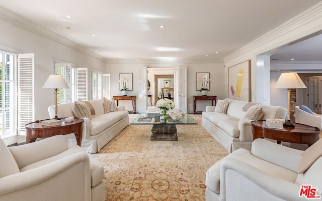 living room with a healthy amount of sunlight and ornamental molding