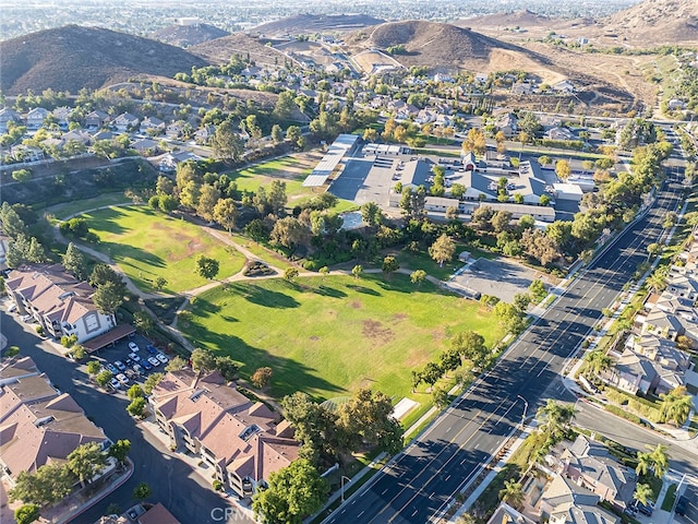 birds eye view of property featuring a mountain view