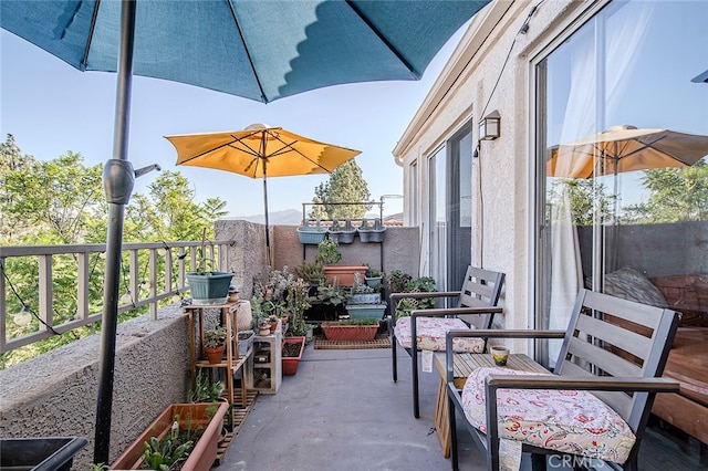 view of patio / terrace with a balcony