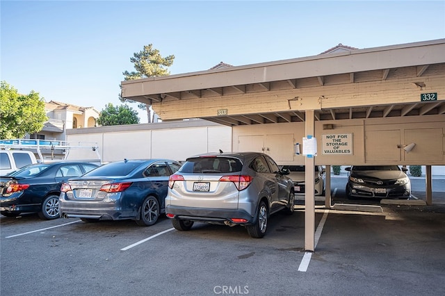 view of car parking featuring a carport