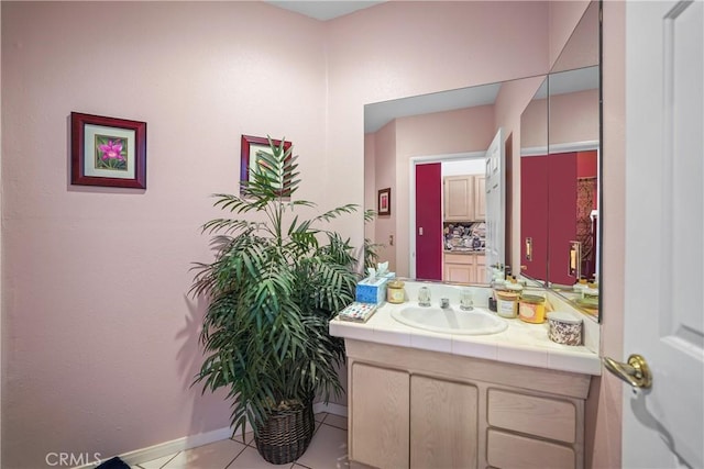 bathroom featuring vanity and tile patterned flooring