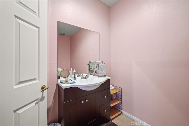 bathroom featuring tile patterned floors and vanity