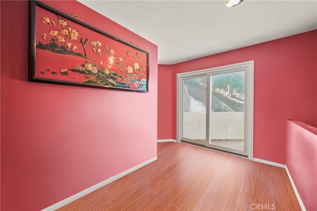 empty room featuring hardwood / wood-style floors