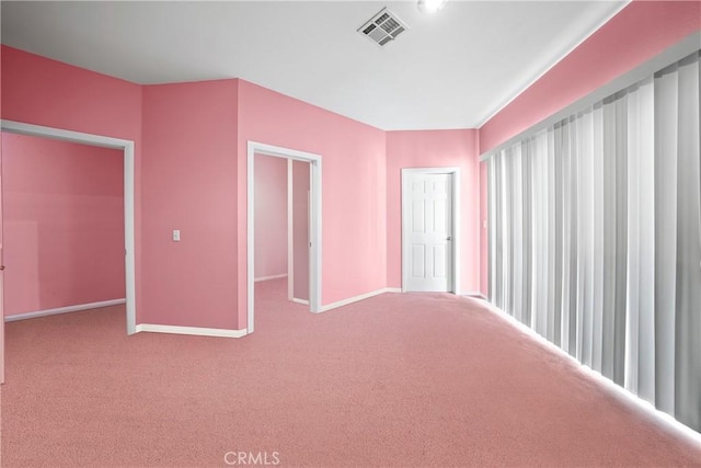 unfurnished bedroom featuring carpet