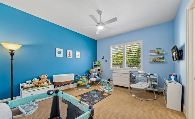 carpeted bedroom featuring ceiling fan