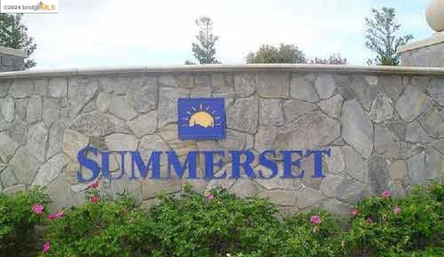 view of community sign