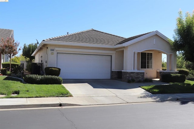 single story home featuring a garage