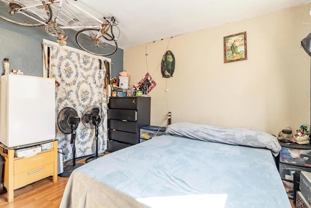 bedroom featuring light hardwood / wood-style flooring