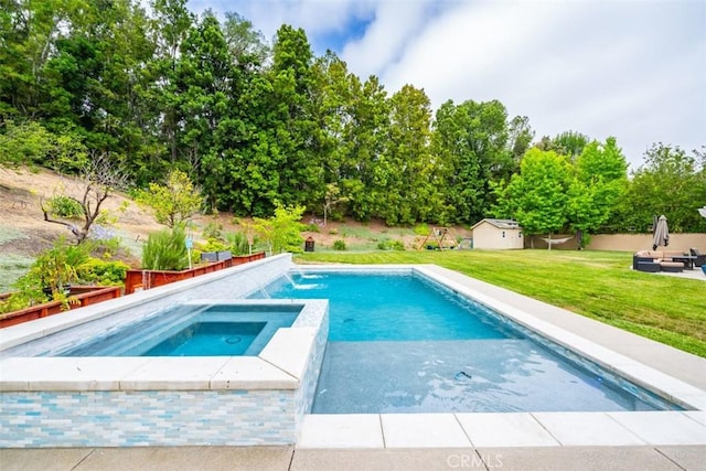 view of pool with an in ground hot tub and a yard