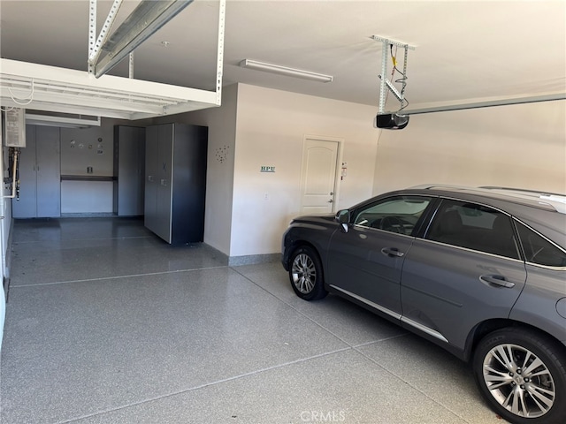 garage featuring a garage door opener