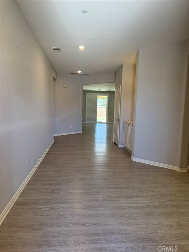 unfurnished room with light hardwood / wood-style flooring