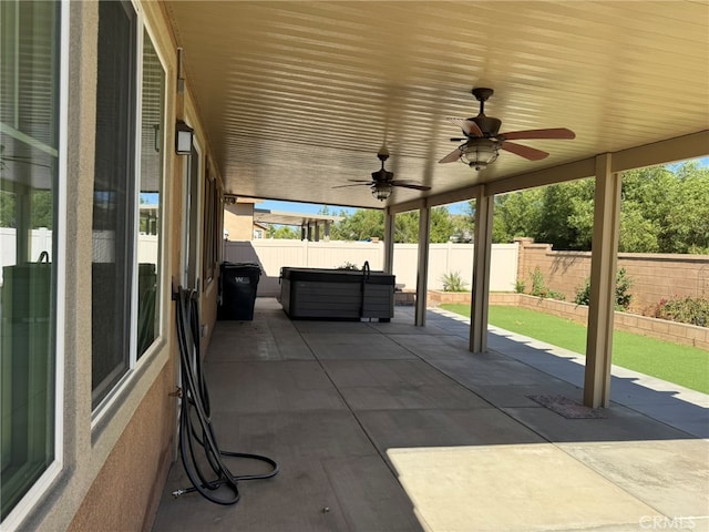 view of patio featuring ceiling fan